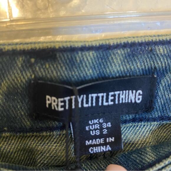 NWT PrettyLittleThing Asymmetrical Denim Mini Skirt Size US 2 - Picture 3 of 7